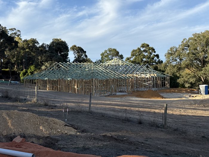 Timber roof and wall frame erected on a new build